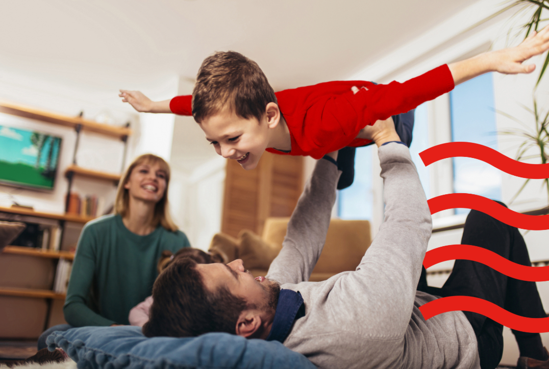 Dad playing with his son