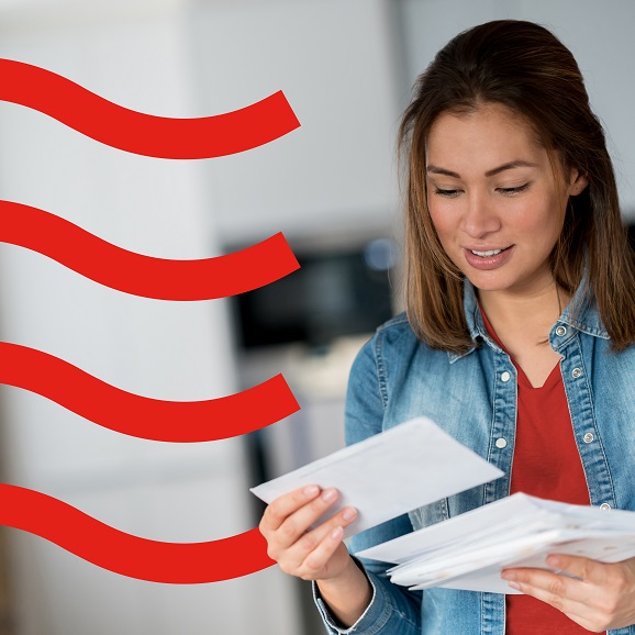 woman looking at mail