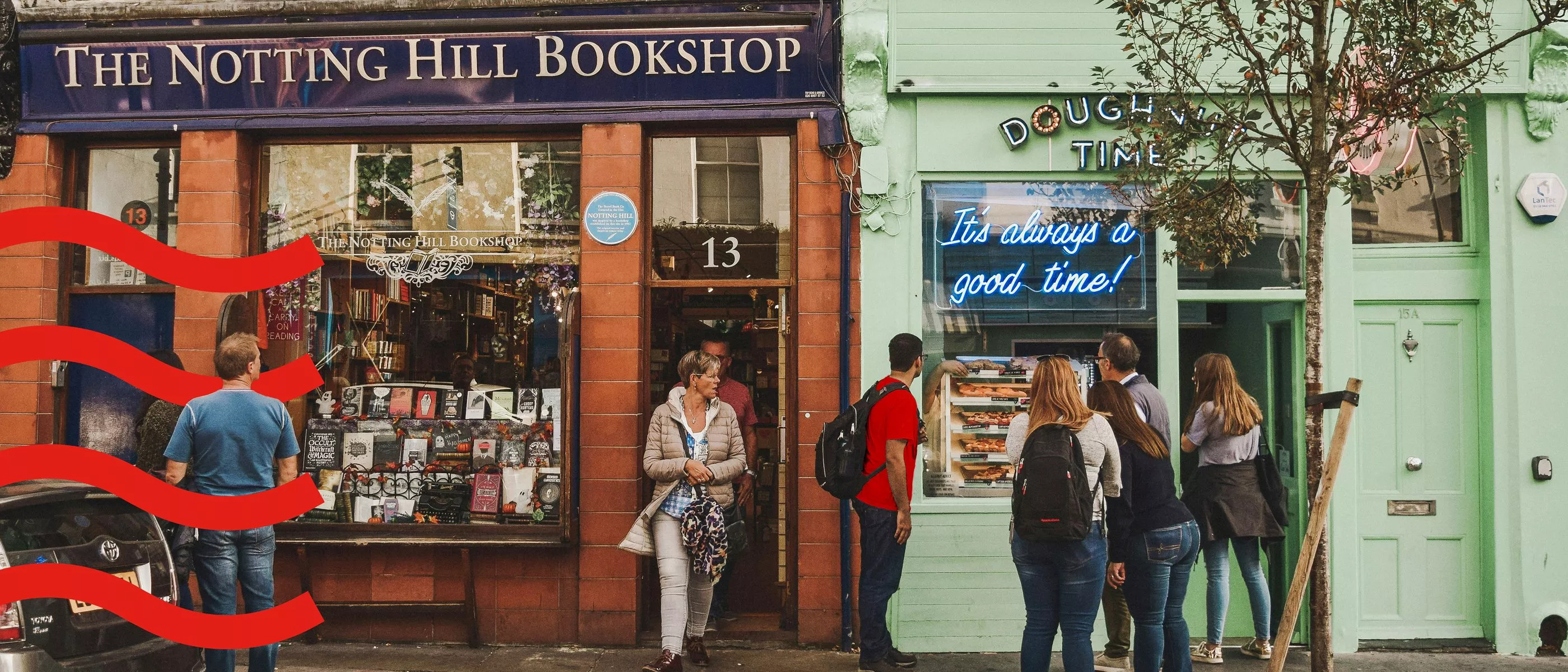 storefronts in London with people looking in windows